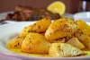 Traditional Greek Lemon Garlic Roasted Potatoes (Patates fournou)